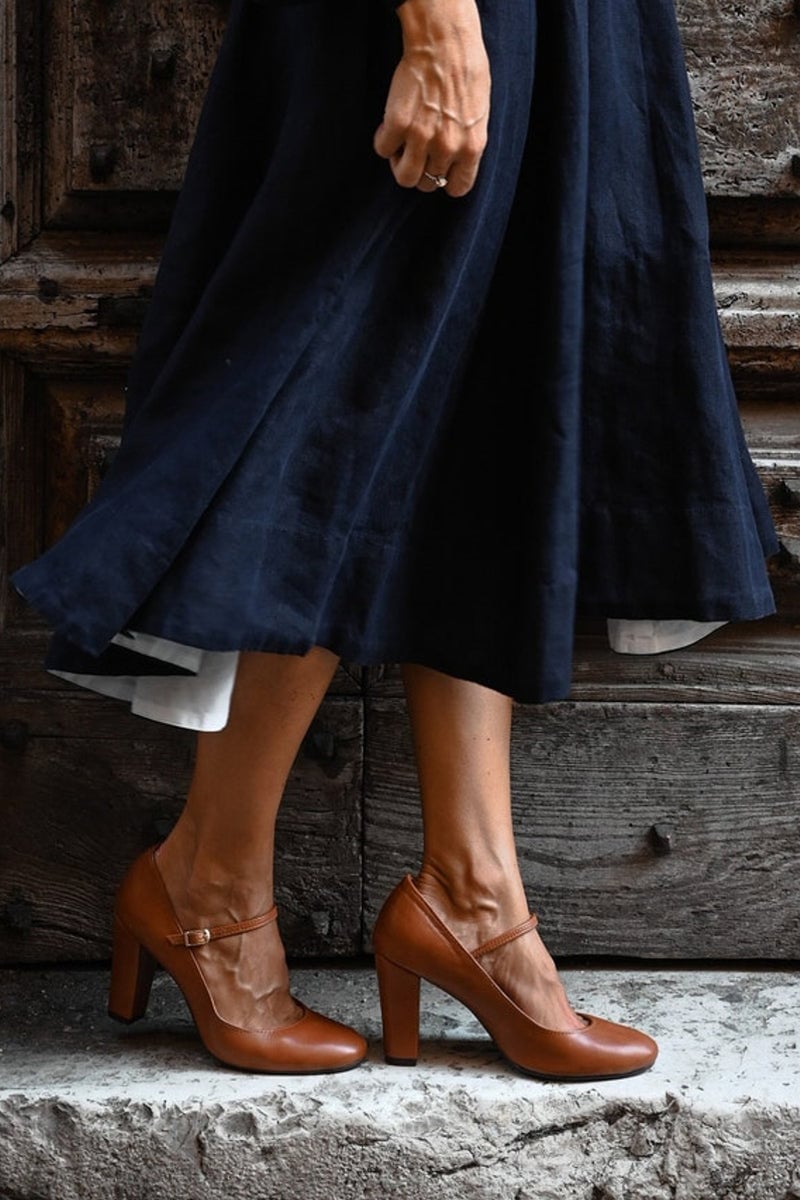 Close-up of Ainsley brown sandal adjustable strap buckle detail