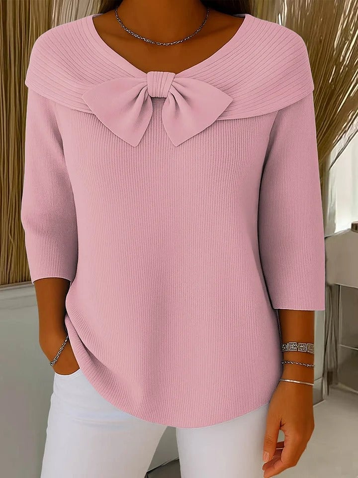 Front view of the Alana bow sweater in pink showing the round neckline and relaxed fit