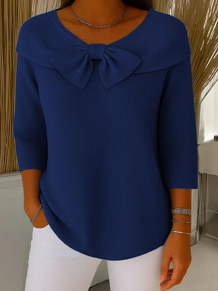 Alana women's bow sweater in black showing the flattering silhouette and knit texture