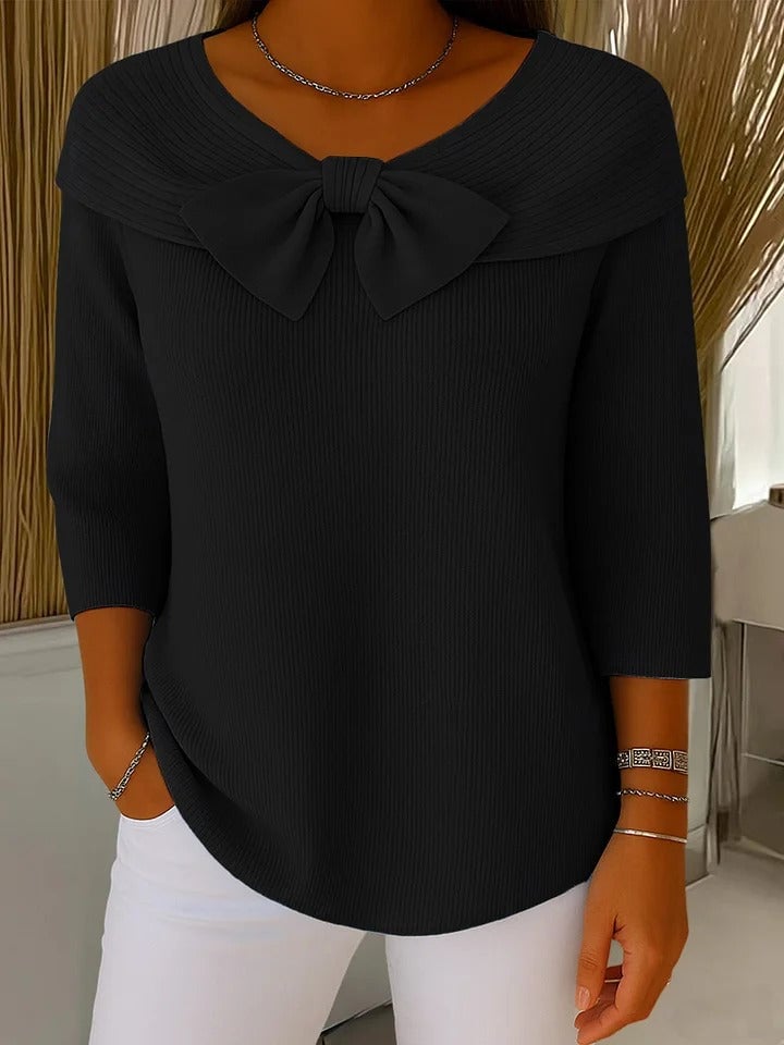 Lifestyle shot of the Alana round-neckline sweater styled for an everyday casual look
