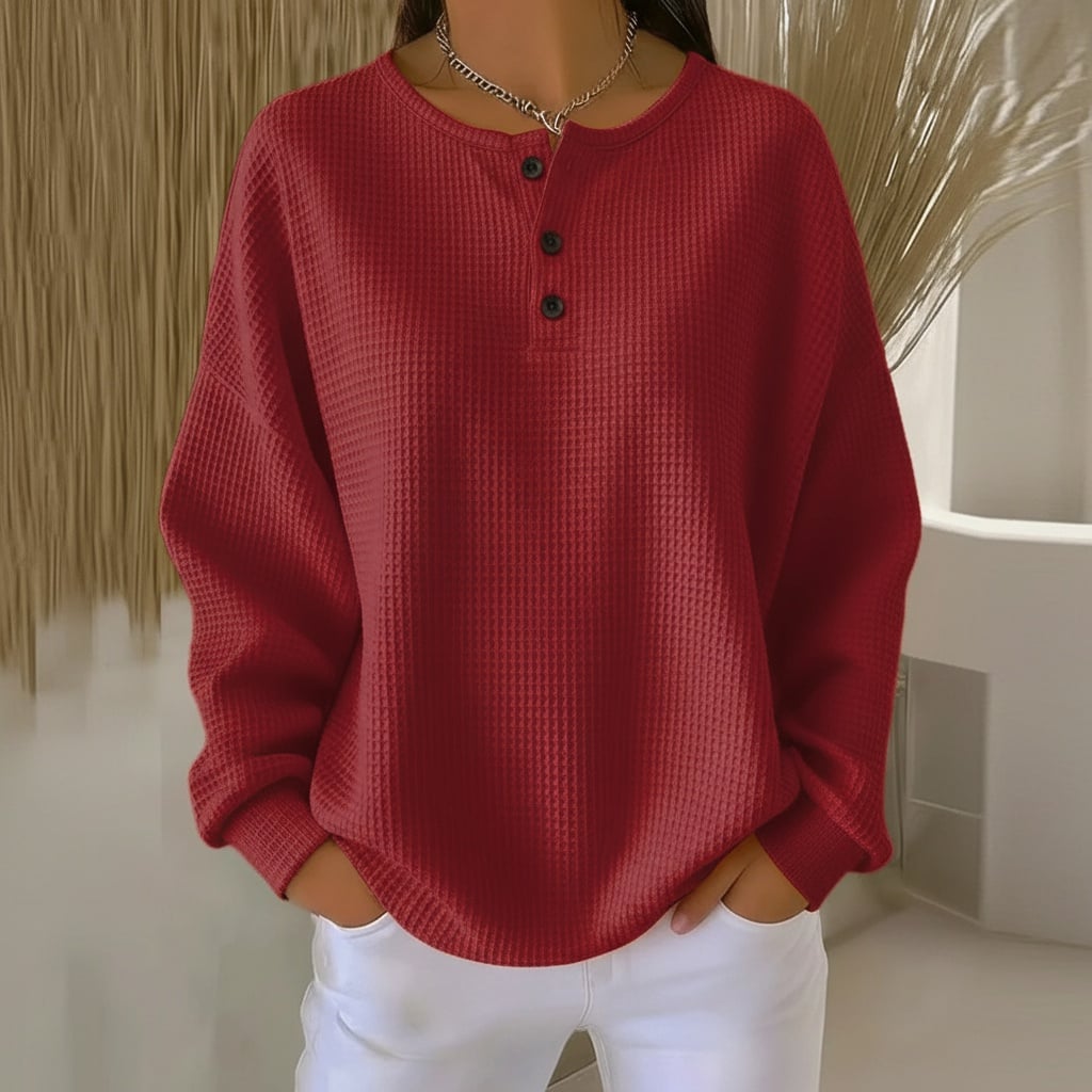 Alexa waffle sweater laid flat showing color options including red, black, orange, and white