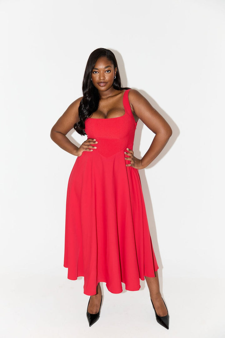 Close-up of the square neckline detail on the white flowy midi dress from BobaFashion
