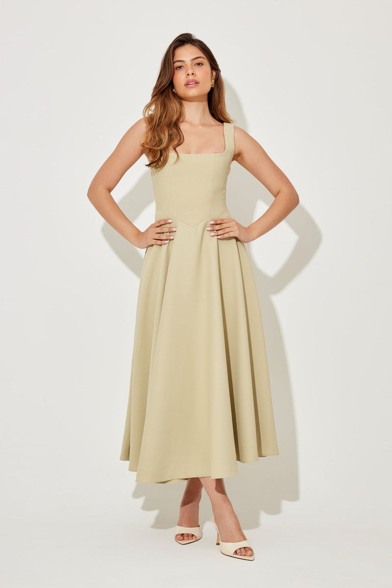 Full-length shot of the BobaFashion midi dress in black with a waist-defining silhouette