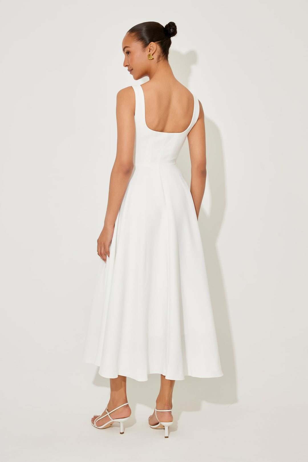 BobaFashion flowy midi dress in red, front view showing the fitted waist and flowing skirt