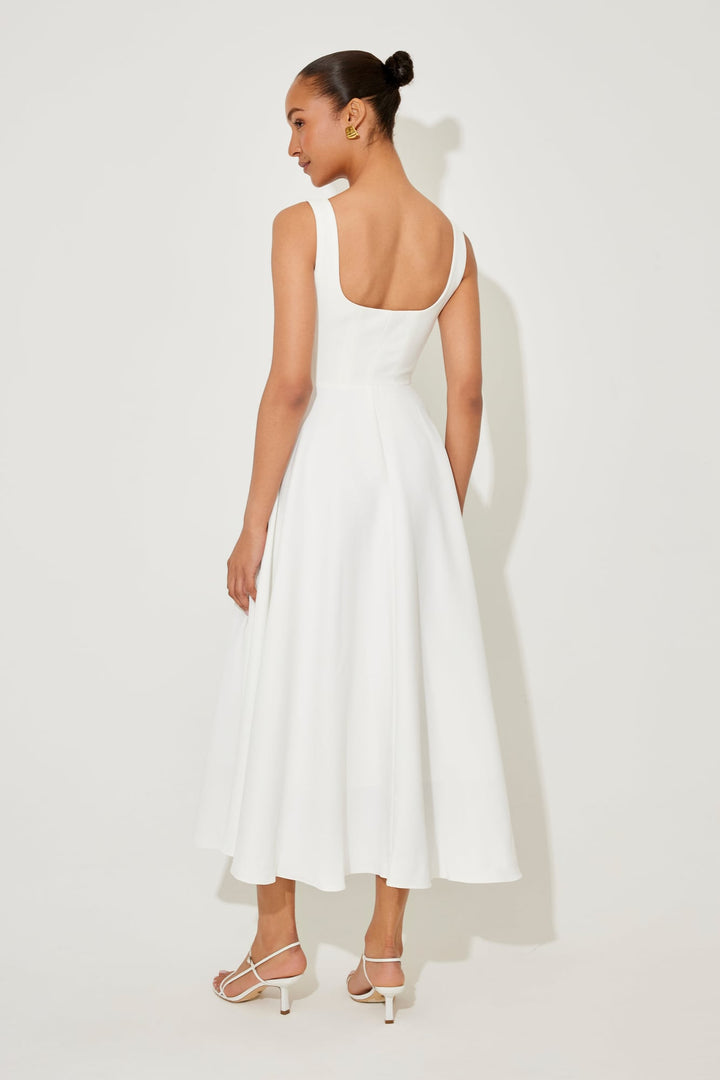 BobaFashion flowy midi dress in red, front view showing the fitted waist and flowing skirt