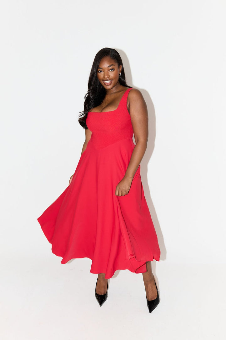Flat lay of the black flowy midi dress from BobaFashion