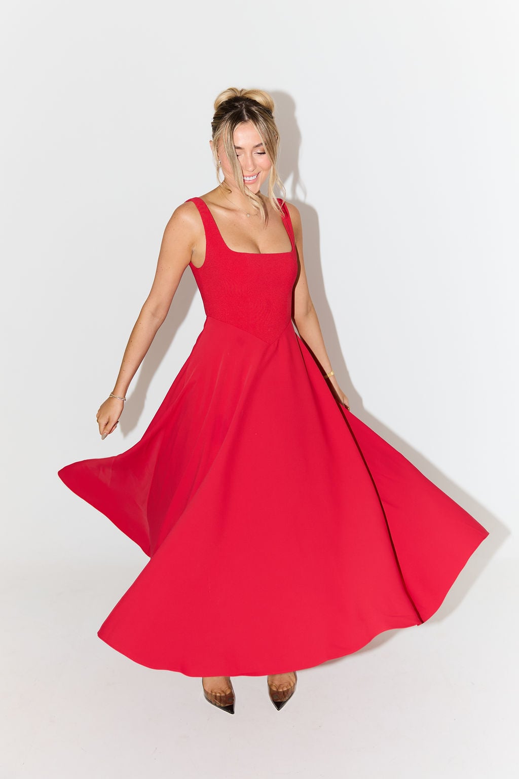 Detail shot of the fabric drape on the BobaFashion flowy midi dress