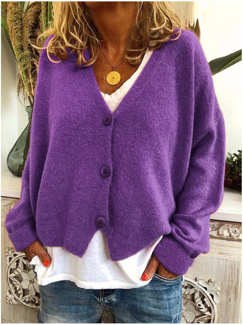 Annelise warm cardigan draped over shoulders, highlighting its cozy yet polished everyday style