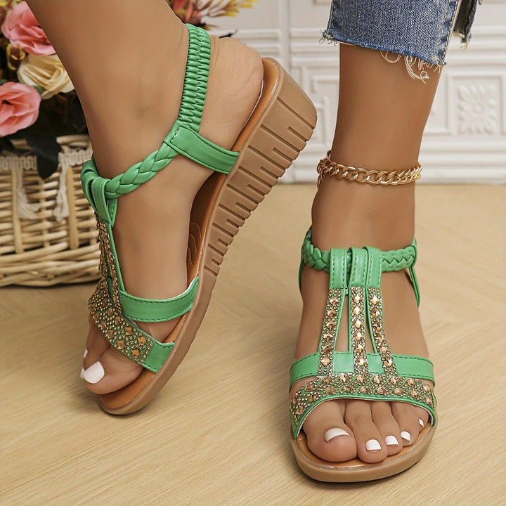 Aria shimmer wedge sandals in rose gold, side view showing heel and sole