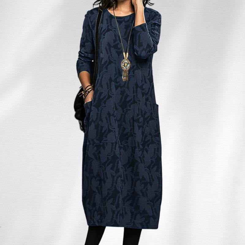Full-length view of the winter dress styled with boots, available in green, burgundy, blue, and black