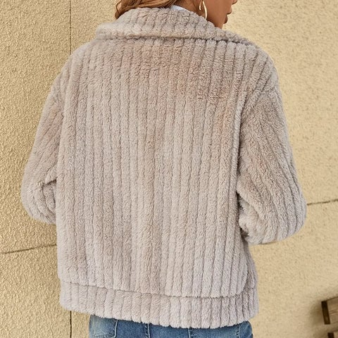 Back view of the Ava elegant jacket in khaki showing clean lines and overall length