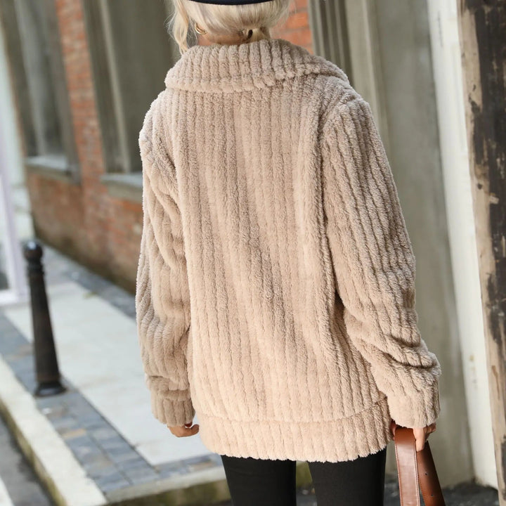 Group of Ava elegant plush jackets displayed in all five available colors: apricot, navy, blue, pink, and khaki