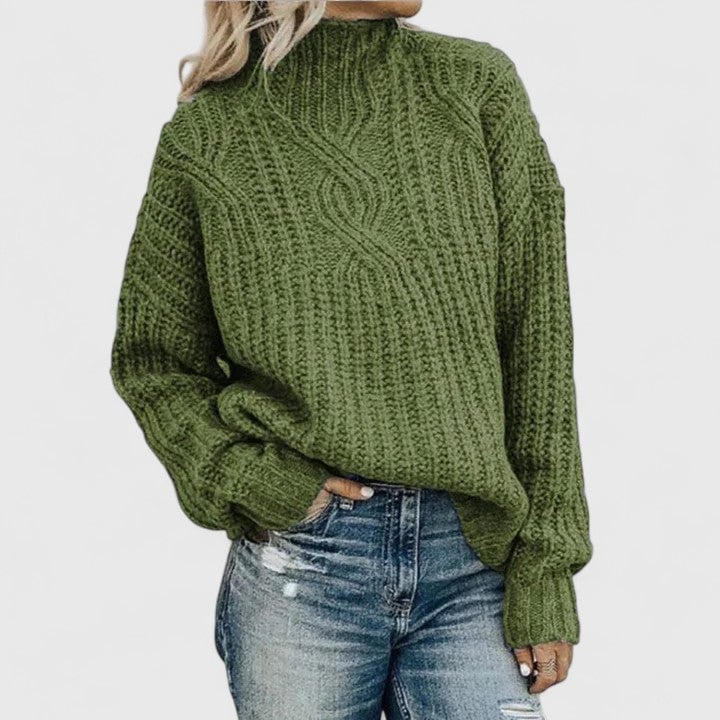 Woman wearing the Avery Sophisticated Sweater in a flattering tailored silhouette, styled with trousers