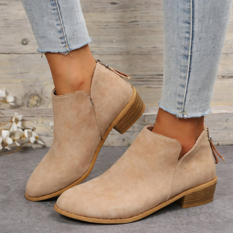 Close-up side view of Beatrix elegant women's boots highlighting the contoured shape and smooth finish