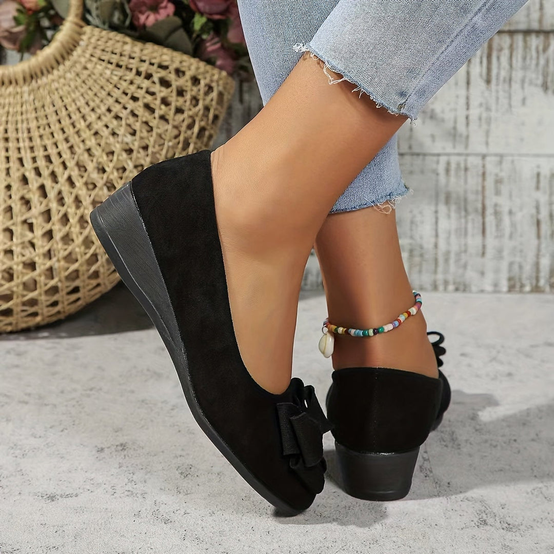 Gray Bella ballet flats, sole and heel view