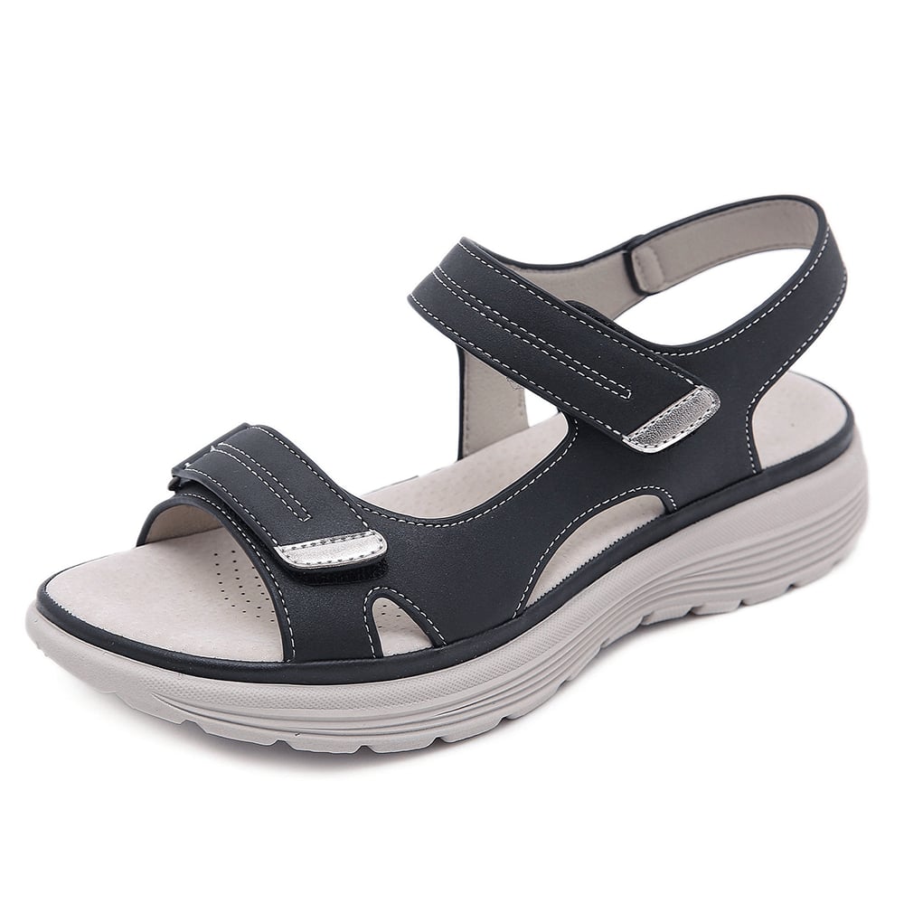 Gray orthopedic sandal showing built-in arch support detail, side view