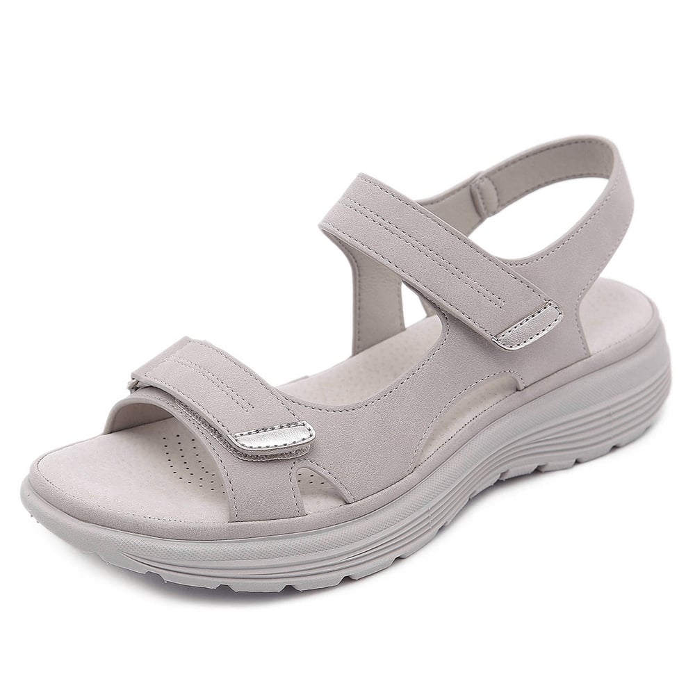 Blue orthopedic sandal flat lay on a light surface highlighting strap design