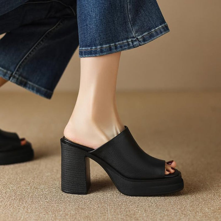 Bianca platform flat sandals styled with a flowy dress, lifestyle shot