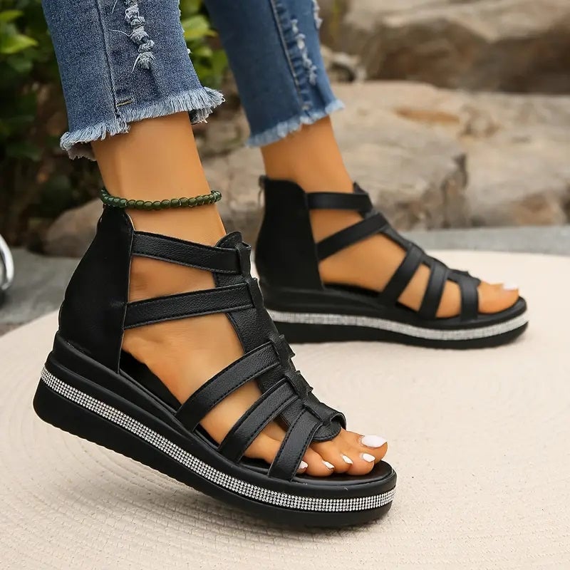 Close-up of Blythe beige wedge sandal heel and sole construction