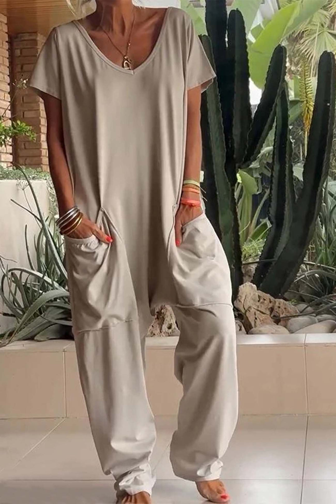 Close-up of the oversized front pockets on the BobaFashion Breezy loose jumpsuit in gray