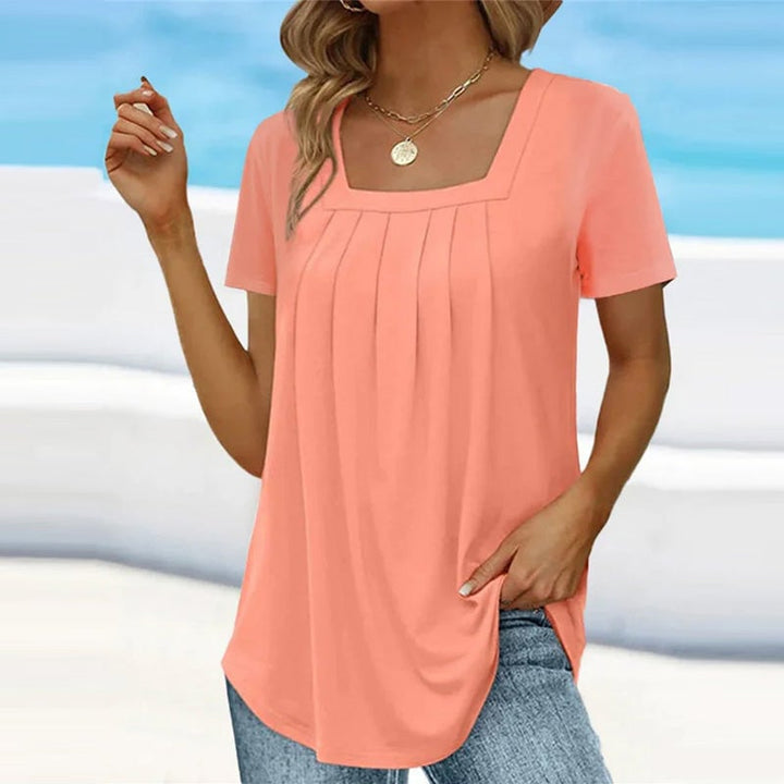 Side view of the flowing relaxed fit of the BobaFashion elegant pleated square-neck blouse
