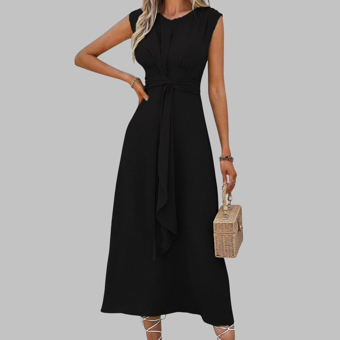 Detail shot of the lightweight fabric and flowing hem of a sleeveless maxi dress