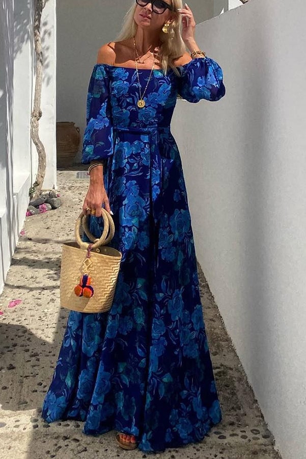 Close-up of the Brooke off-shoulder neckline and floral print detail on a blue maxi dress