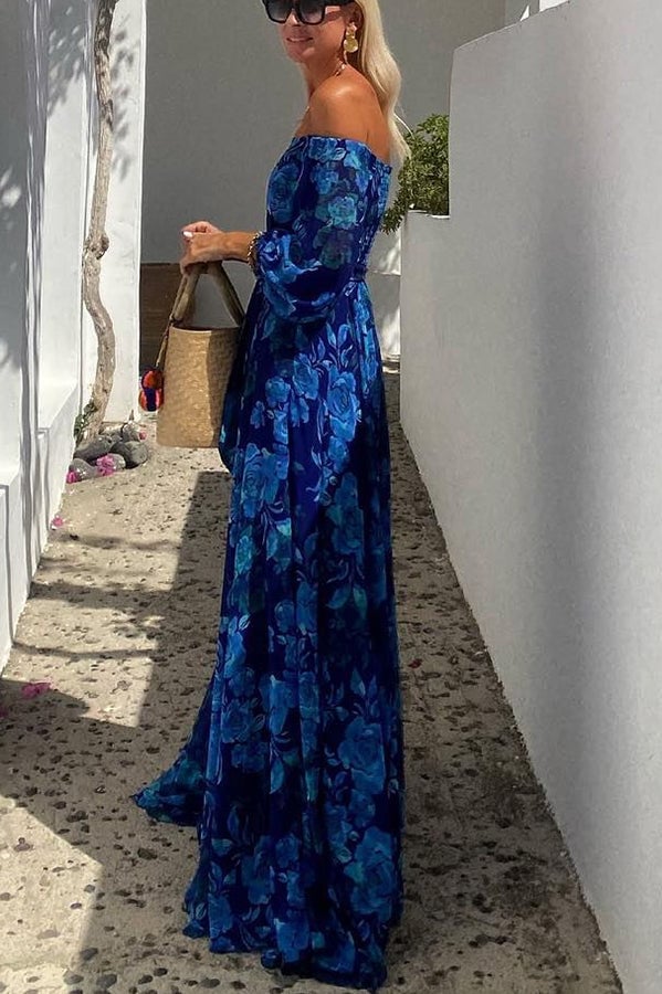 Side view of the Brooke blue floral maxi dress showing its breezy, elongating silhouette