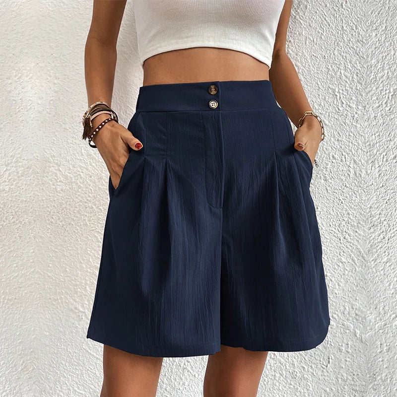 Close-up of women's shorts showing contrast stitching and side pocket detail