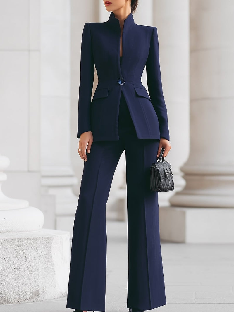 Front view of the Celeste stand collar blazer and wide leg pants suit set in blue on a model