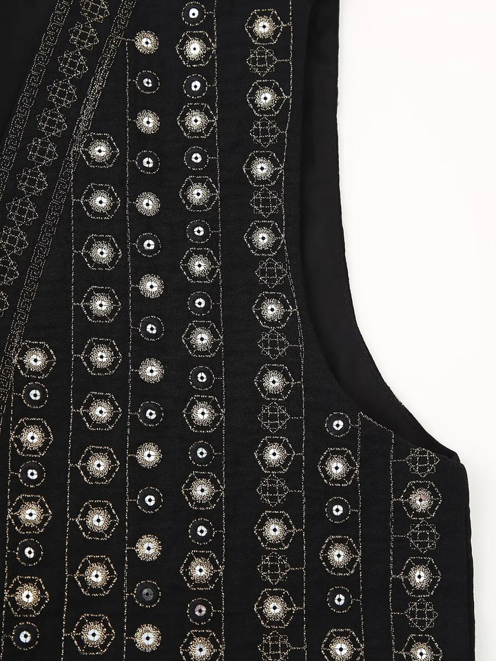 Back view of black sequin embroidered boho vest showing cropped cut and embroidery detail