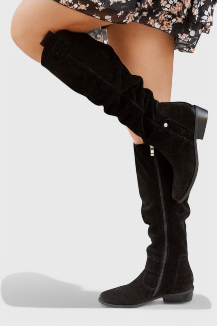 Close-up of cushioned insole and flexible sole on BobaFashion retro high boots