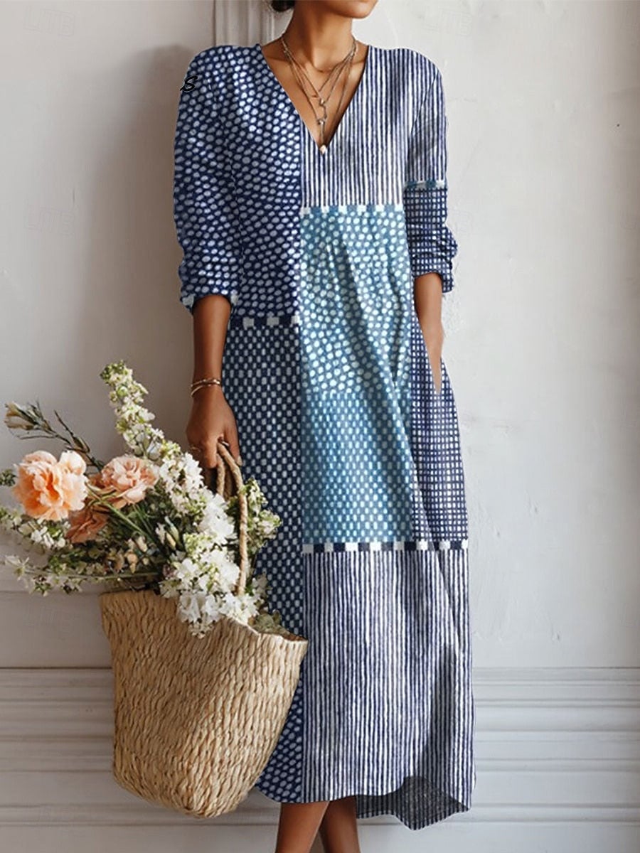 Women's floral V-neck midi dress in light blue, full-length front view showing overall silhouette