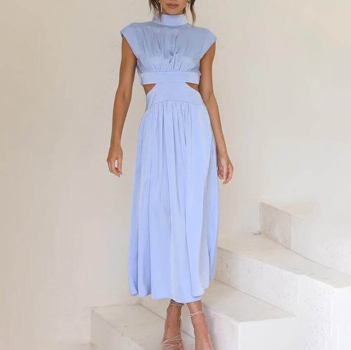 Side profile view of the flowing silhouette of the BobaFashion halter dress