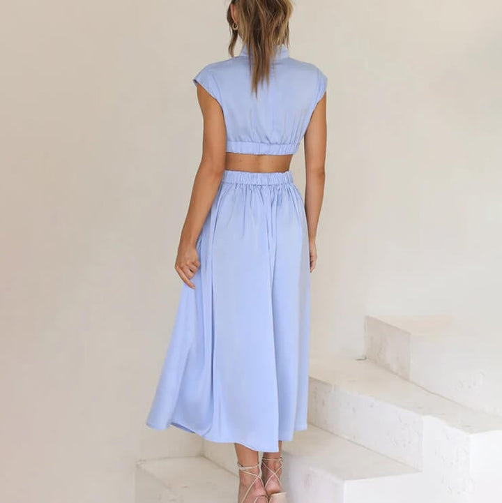 Lifestyle shot of a woman in the BobaFashion halter dress outdoors in natural light