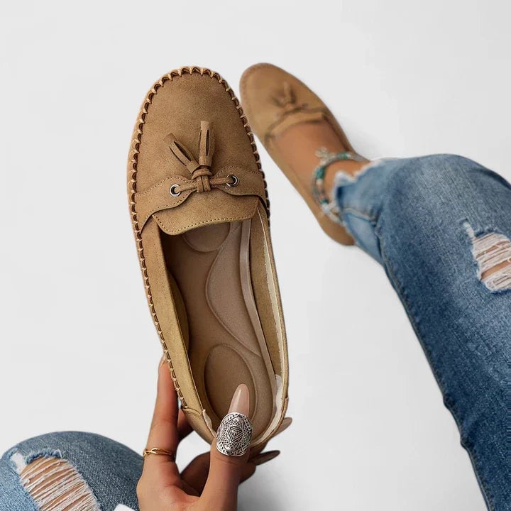 Outsole view of Clea flat loafers showing cushioned insole and flat rubber outsole