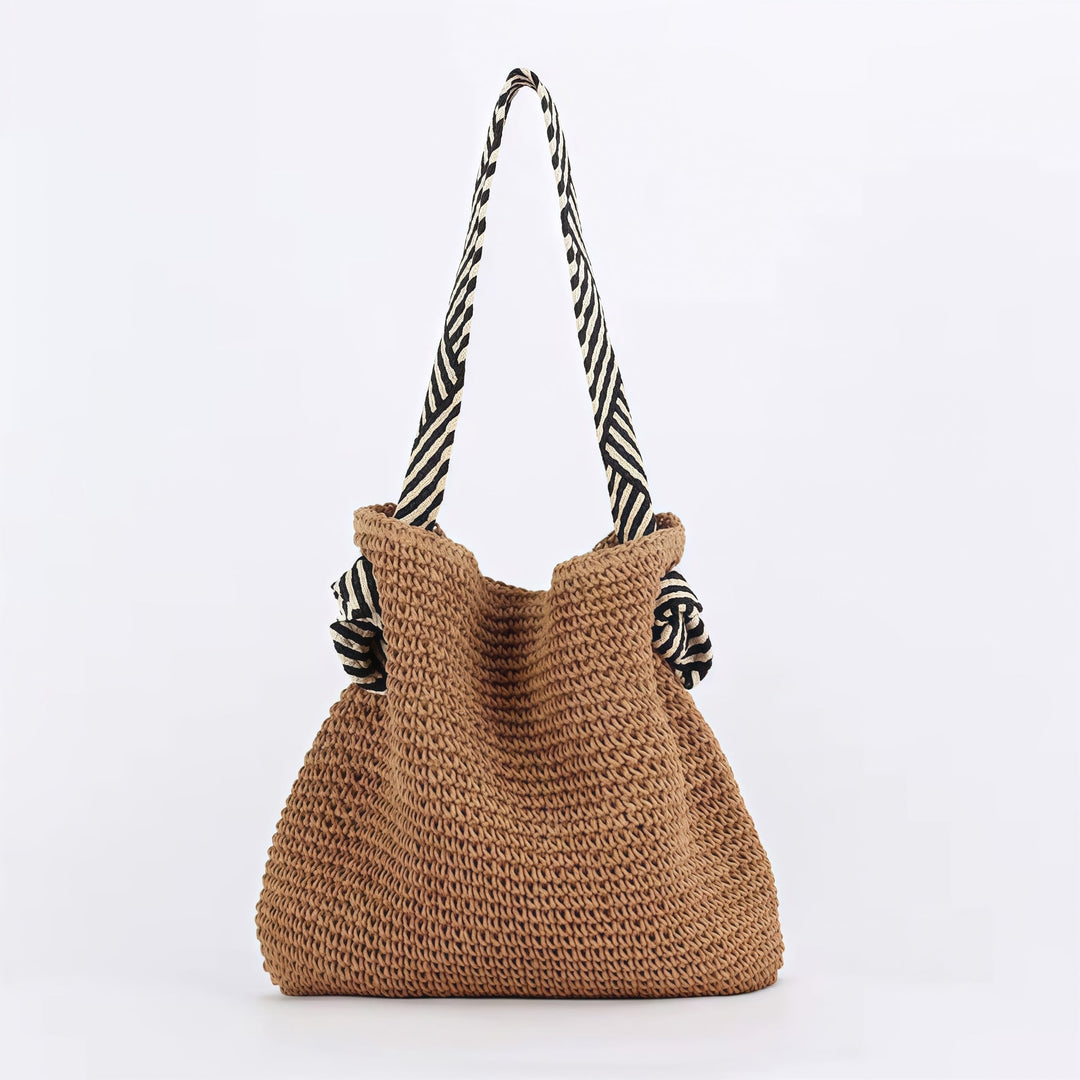 Close-up of textured handwoven exterior on a natural beige boho shoulder bag from BobaFashion