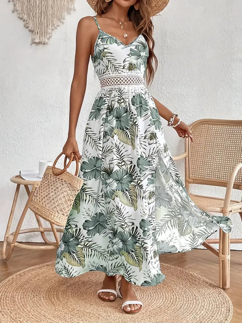 Woman wearing the Colette floral midi dress in green, flowing silhouette, perfect for summer occasions