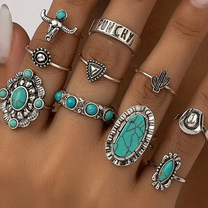 Turquoise western ring set worn with boho accessories on model's hand