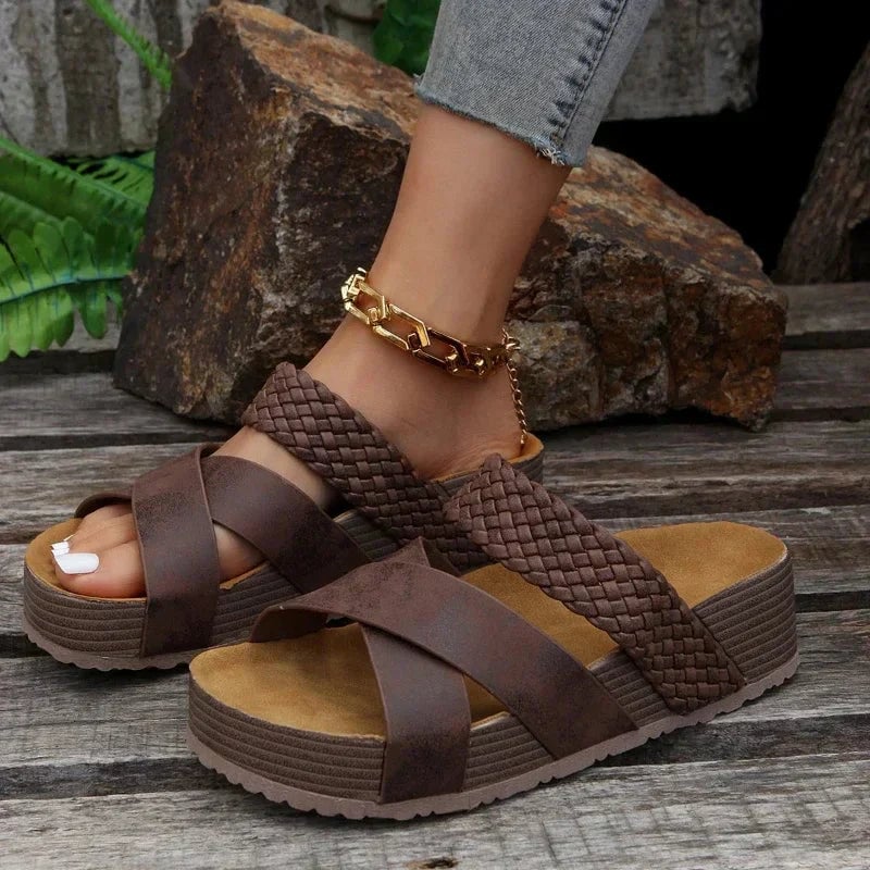 Close-up detail of the Dana sandal ergonomic sole and flexible strap construction