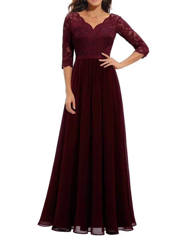 Model wearing a black short sleeve lace long dress, showcasing the flattering feminine silhouette