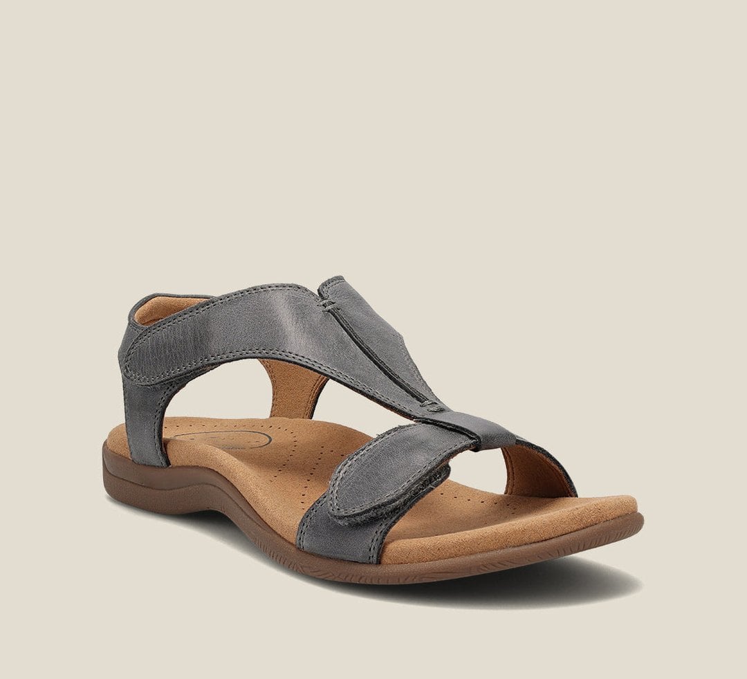 Close-up of Dove sandal's ergonomic arch support contoured footbed