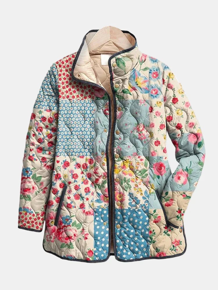 Woman wearing a multicolor floral quilted jacket with a relaxed, flattering fit — lightweight and perfect for everyday layering