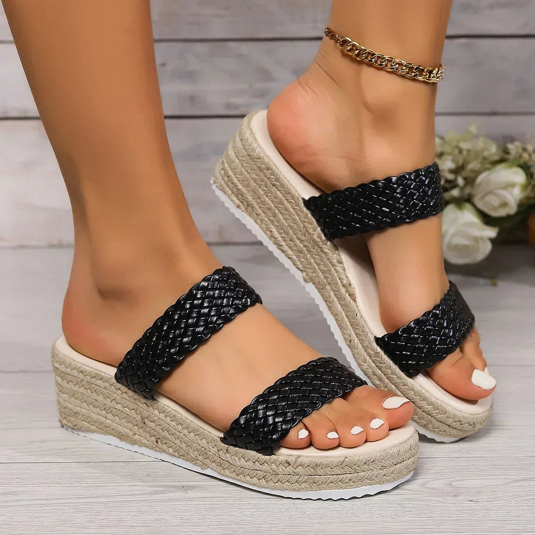 Elle woven platform flat sandals in beige worn on feet, lifestyle angle