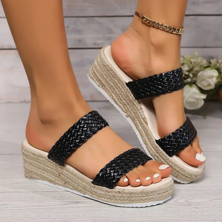 Elle woven platform flat sandals in beige worn on feet, lifestyle angle