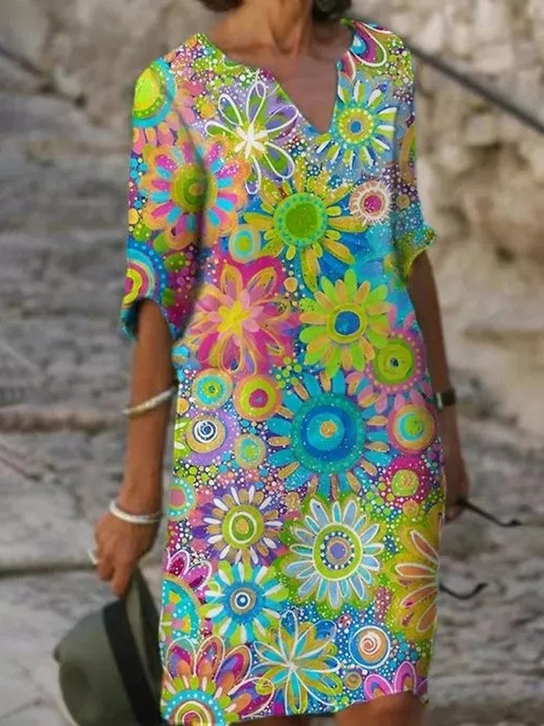 Front view of the Ellery elegant floral dress in pink with a gently shaped waist and breezy silhouette
