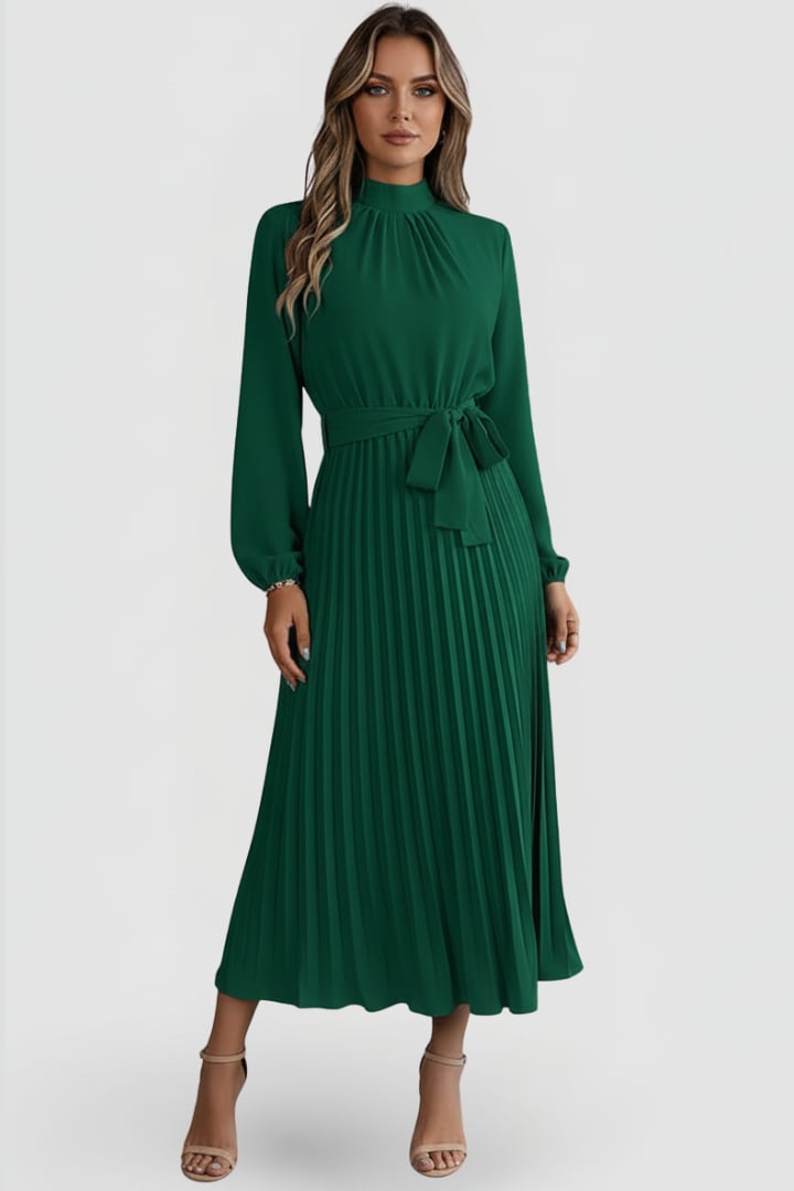 Elowen long sleeve pleated midi dress styled with heels in Pink
