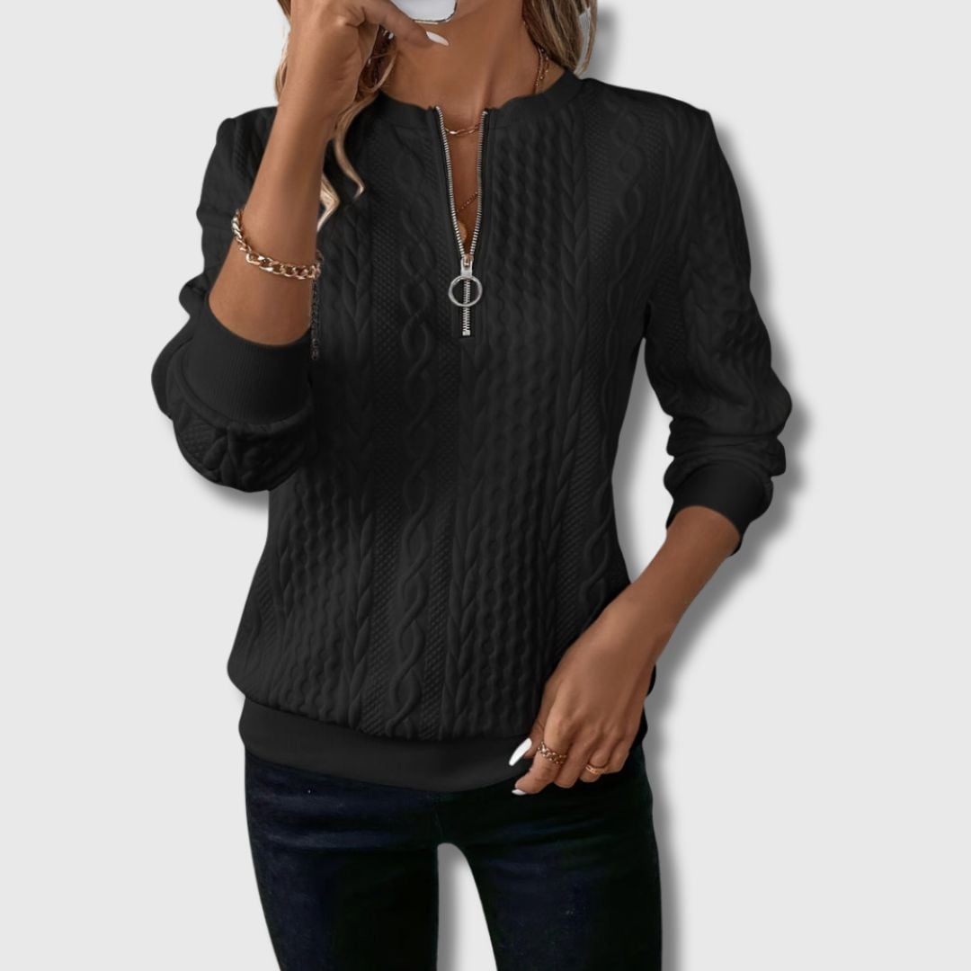 Emily elegant sweater styled with trousers for a polished everyday look