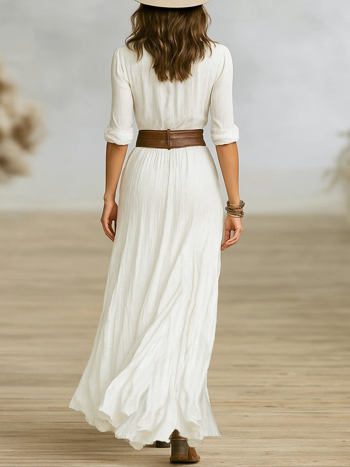 Flat lay of the Emmeline elegant pleated dress showing available colors