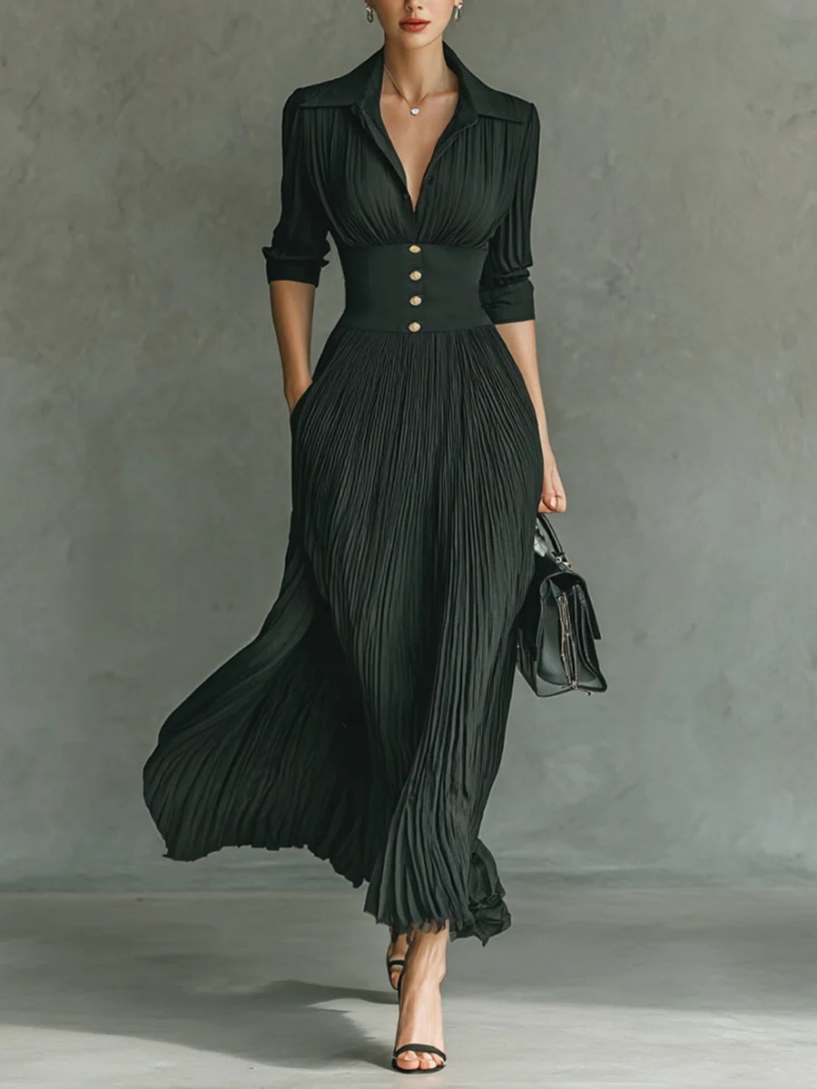 Woman wearing a black fitted waist dress with elegant tailored silhouette, front view